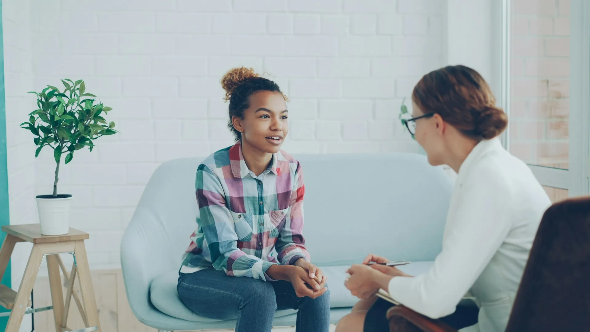talking to a person on couch